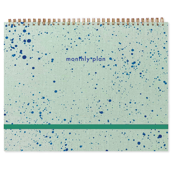 Blackbird undated monthly planner sketchbook by Moglea, featuring splatter-style pages and a durable notebook cover.
