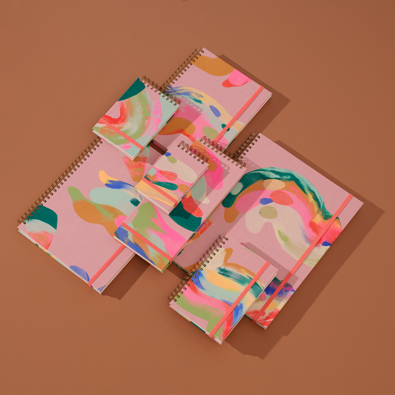 Moglea Palmita Slim Notebook in various sizes, featuring a sleek, minimalist design with a smooth cover and compact form.